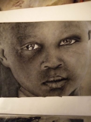 realistic pencil drawing of a young child's face close up