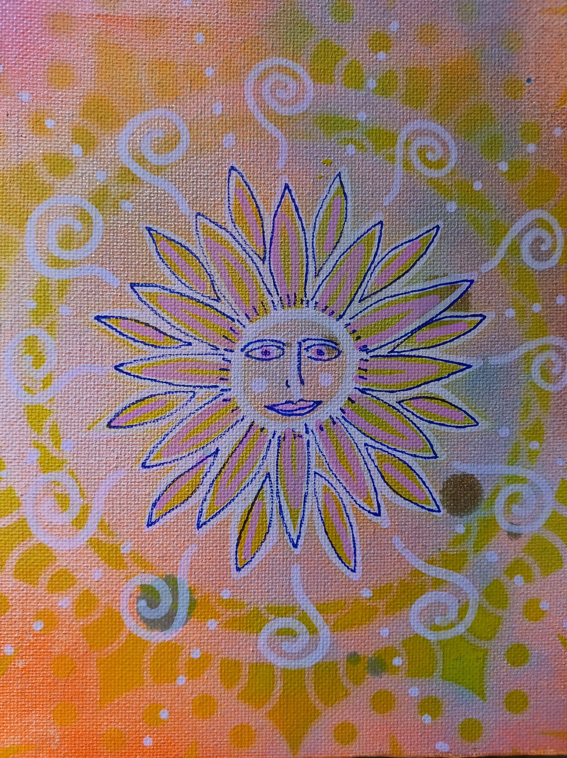 This painting has a background created with spray paint and a stencil that makes a repeating mandala type pattern in yellow, green, peach and gold. Soft colors and blending. There is a sun in the middle in the style of a mandala with beams of light looking a bit like flower petals. He has a contented look on his face drawn and thin blue lines which also outline the petals. The sun itself is a bright happy yellow with light pink accents and outlines. The light pink lines extend between the petals and create spiral patterns on some of the gaps between the petals, or dotted lines on alternate gaps. This creates the feeling that the sun is expanding from the center as it's "light" extends to the edge of the canvas
